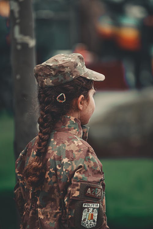 A Woman Wearing a Camouflage Uniform // Healthier Veterans Today