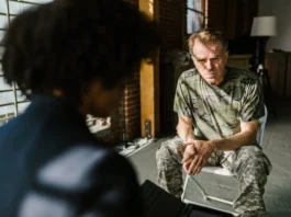 Photo of an Old Man Talking to a Psychiatrist // Healthier Veterans Today