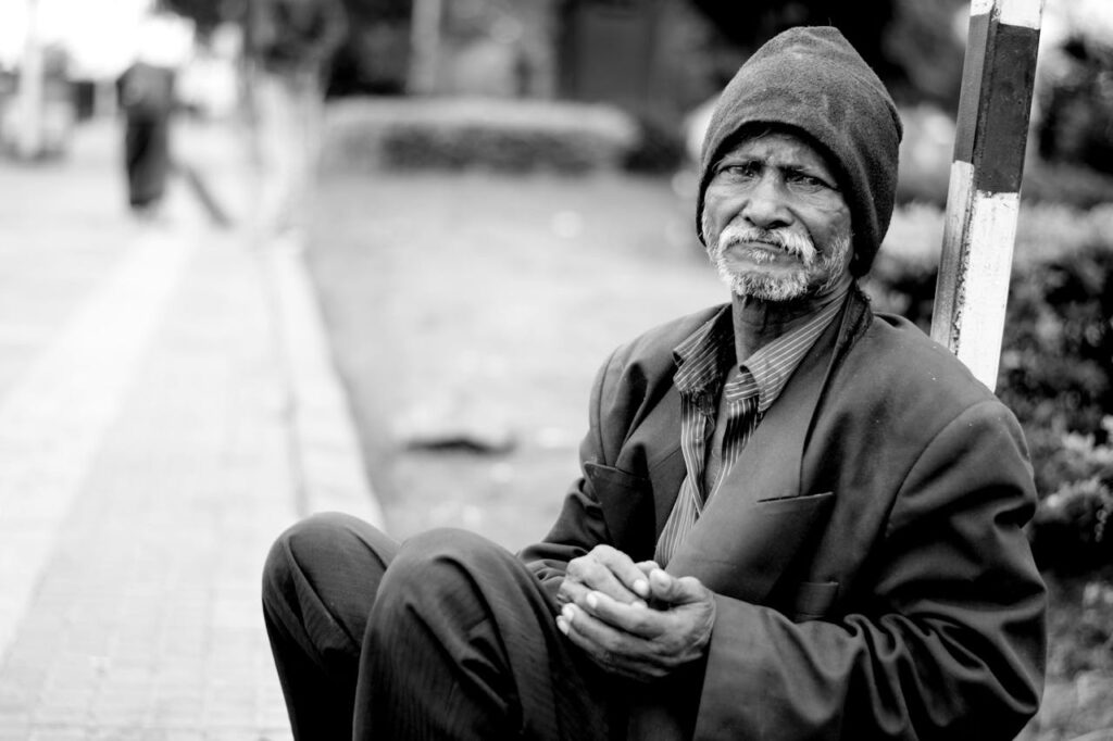 Grayscale Photography of Man Sitting // Healthier Veterans Today