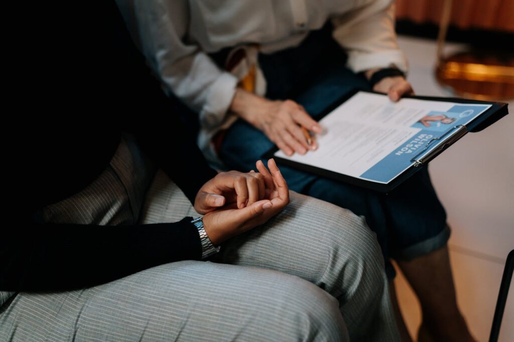 Person in White Long Sleeve Shirt Holding a Clipboard with Resume // Healthier Veterans Today