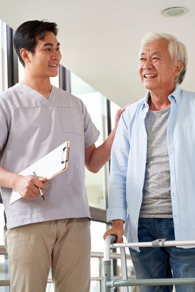 Medical professional talking to patient while holding a sheet with a clipboard // Healthier Veterans Today