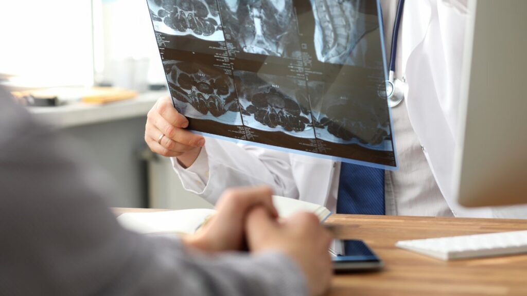 Medical Professional showing patient a scan // Healthier Veterans Today