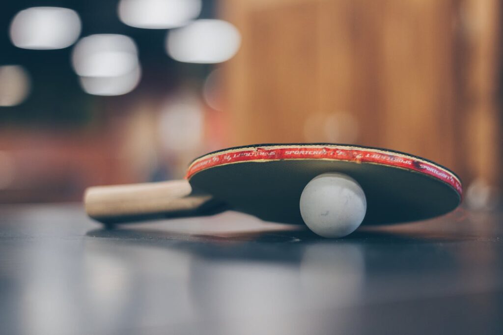 Selective Focus Photo of Table Tennis Ball and Ping-pong Racket // Healthier Veterans Today