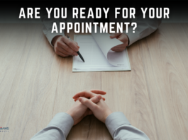Veterans Recruitment Appointment preparation image showing an applicant seated across a desk from a recruiter who is reviewing paperwork, with the question “Are You Ready for Your Appointment?” displayed above // Healthier Veterans Today