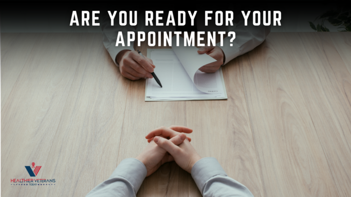 Veterans Recruitment Appointment preparation image showing an applicant seated across a desk from a recruiter who is reviewing paperwork, with the question “Are You Ready for Your Appointment?” displayed above // Healthier Veterans Today